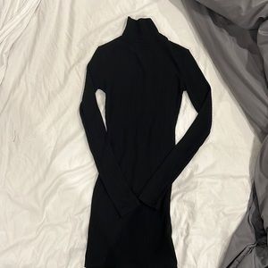 Classic Turtleneck black sweater.